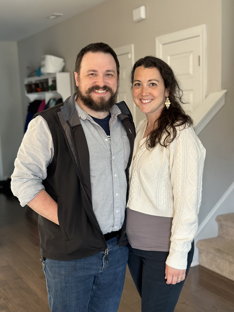 Matt and Val Davis smiling together at home